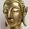 Vergoldung eines Buddha